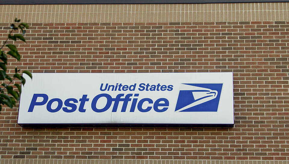 The postal service sign