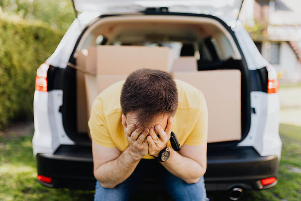 A man is stressed because he didn't hire a moving company in the Bay Area