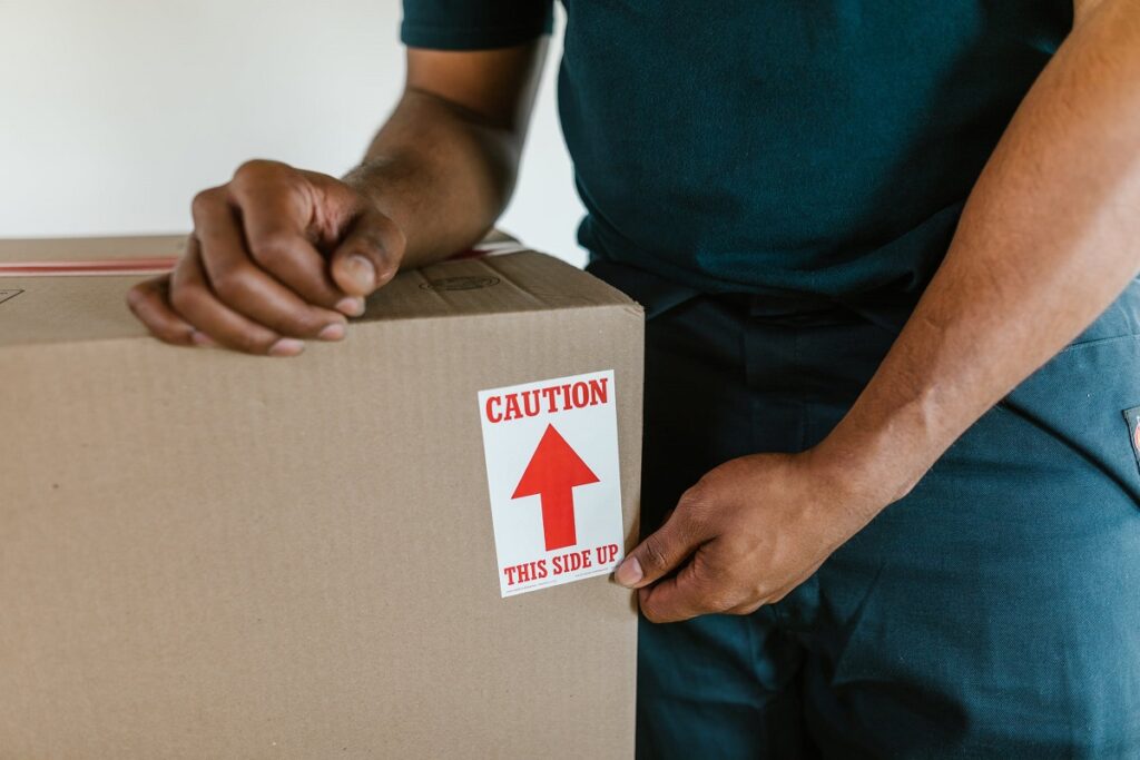 mover packing a box